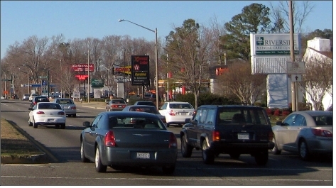 Improving the appearance of existing
uses along major thoroughfares by requiring
façade improvements, landscaping, underground utilities and less obtrusive signage, will help
improve the City’s image. Redevelopment.svg